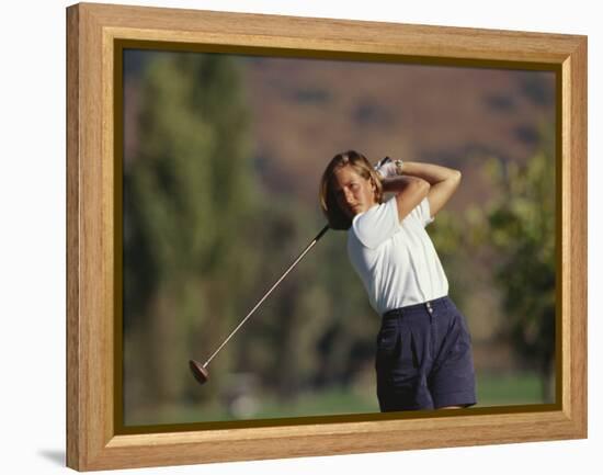 Woman Golfer in Action-Chris Trotman-Framed Premier Image Canvas