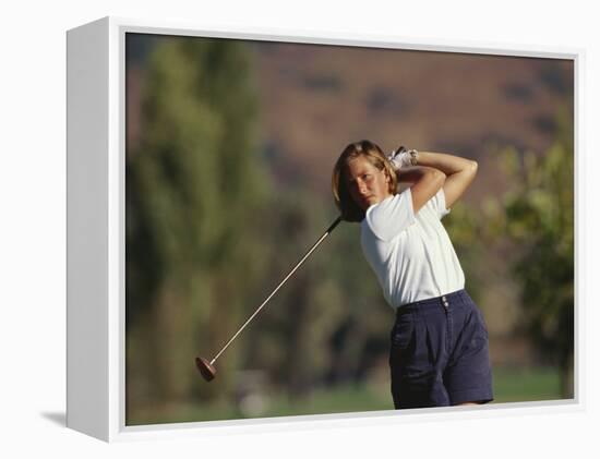 Woman Golfer in Action-Chris Trotman-Framed Premier Image Canvas