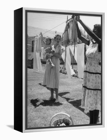Woman Hanging the Laundry Out to Dry-Nina Leen-Framed Premier Image Canvas