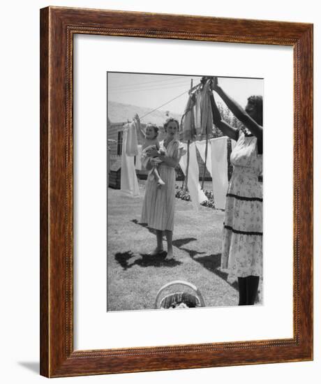 Woman Hanging the Laundry Out to Dry-Nina Leen-Framed Photographic Print