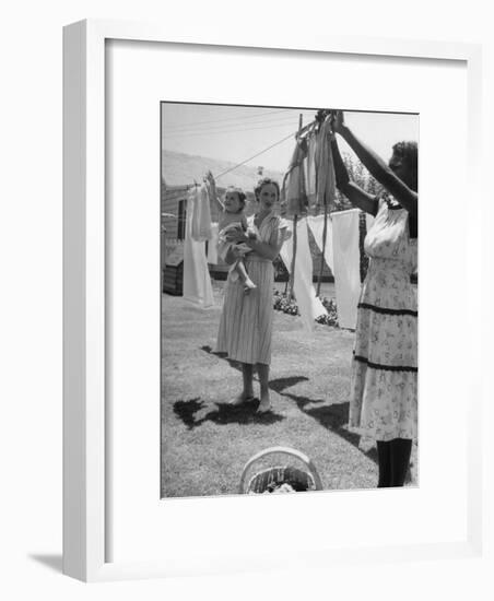 Woman Hanging the Laundry Out to Dry-Nina Leen-Framed Photographic Print