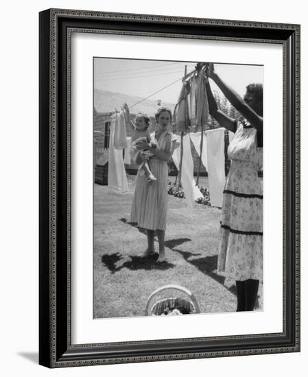 Woman Hanging the Laundry Out to Dry-Nina Leen-Framed Photographic Print