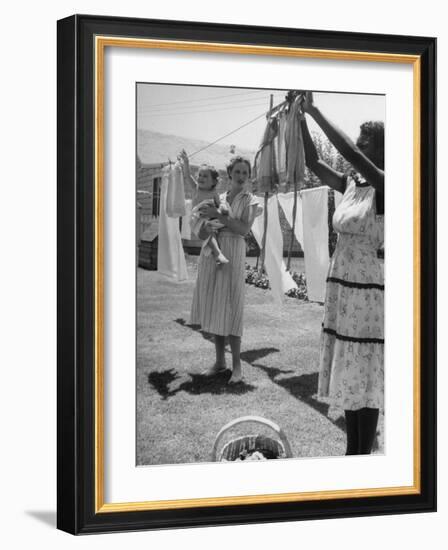 Woman Hanging the Laundry Out to Dry-Nina Leen-Framed Photographic Print