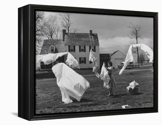 Woman Hanging Up the Laundry on the Line-Ed Clark-Framed Premier Image Canvas