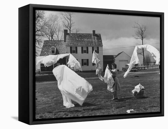 Woman Hanging Up the Laundry on the Line-Ed Clark-Framed Premier Image Canvas