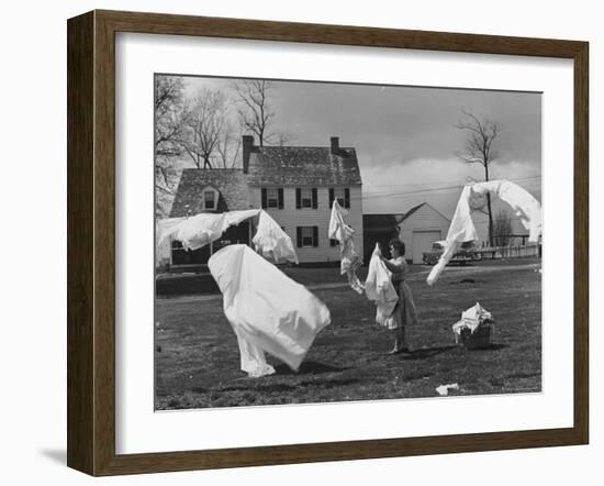 Woman Hanging Up the Laundry on the Line-Ed Clark-Framed Photographic Print