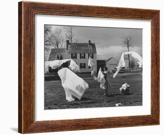 Woman Hanging Up the Laundry on the Line-Ed Clark-Framed Photographic Print