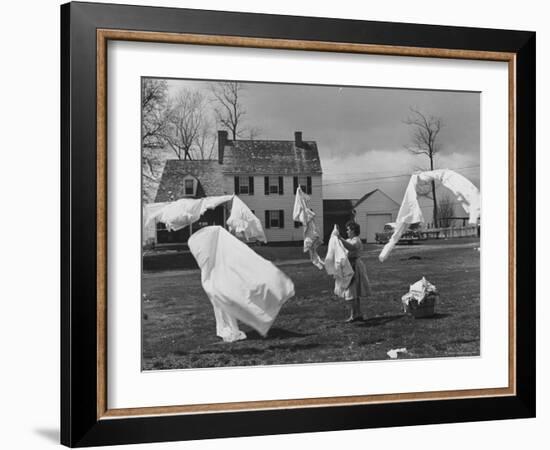 Woman Hanging Up the Laundry on the Line-Ed Clark-Framed Photographic Print