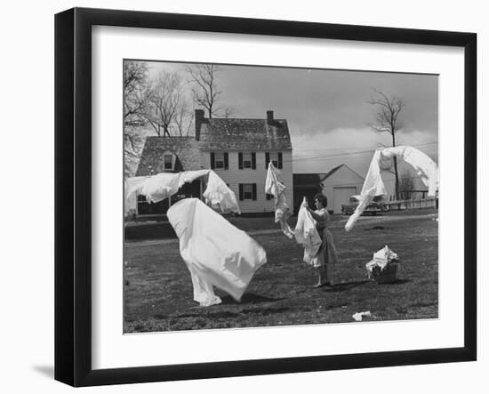 Woman Hanging Up the Laundry on the Line-Ed Clark-Framed Photographic Print