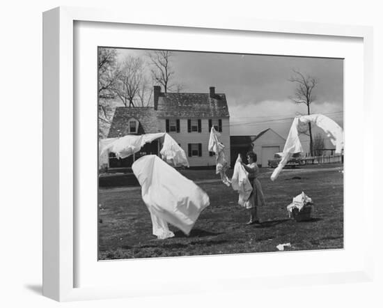 Woman Hanging Up the Laundry on the Line-Ed Clark-Framed Photographic Print