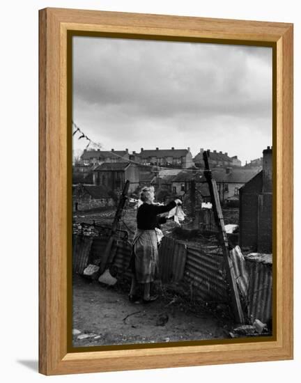 Woman Hanging Wash in a Dublin Slum-Tony Linck-Framed Premier Image Canvas