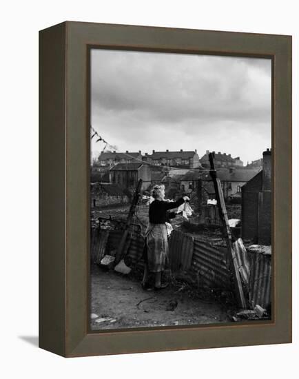 Woman Hanging Wash in a Dublin Slum-Tony Linck-Framed Premier Image Canvas