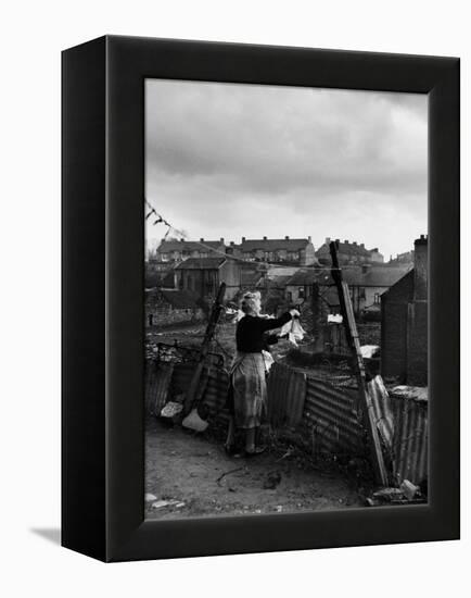 Woman Hanging Wash in a Dublin Slum-Tony Linck-Framed Premier Image Canvas