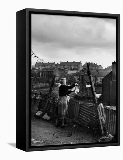 Woman Hanging Wash in a Dublin Slum-Tony Linck-Framed Premier Image Canvas