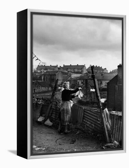 Woman Hanging Wash in a Dublin Slum-Tony Linck-Framed Premier Image Canvas