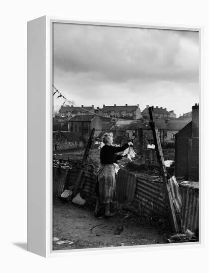 Woman Hanging Wash in a Dublin Slum-Tony Linck-Framed Premier Image Canvas