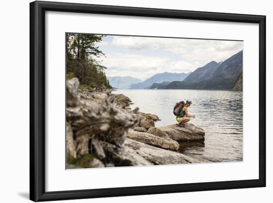 Woman Hangs Out On The Shore Of A Lake In British Columbia In Valhalla National Park, Bc-Hannah Dewey-Framed Photographic Print