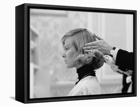 Woman Having Her Hair Styled at Hair Salon at Saks Fifth Avenue-Yale Joel-Framed Premier Image Canvas