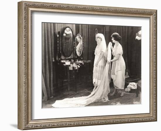 Woman Helping Bride Get Dressed-null-Framed Photo