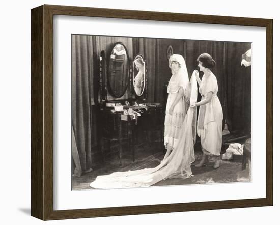 Woman Helping Bride Get Dressed-null-Framed Photo