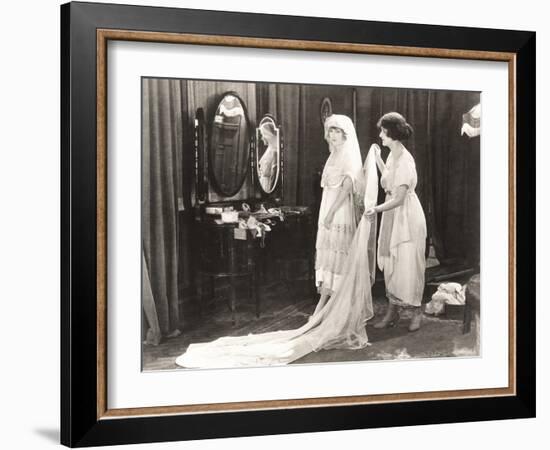 Woman Helping Bride Get Dressed-null-Framed Photo