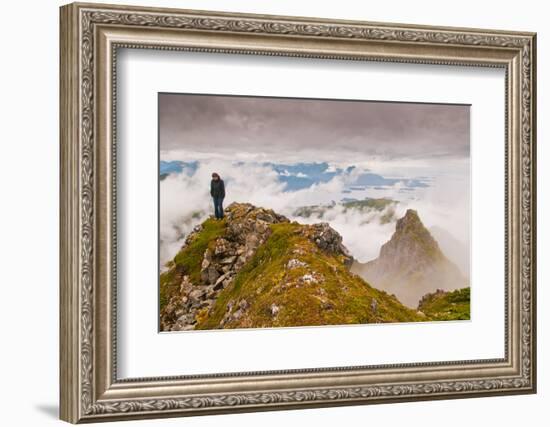 Woman high atop cloudy Harbor Mountain, Sitka, Alaska-Mark A Johnson-Framed Photographic Print