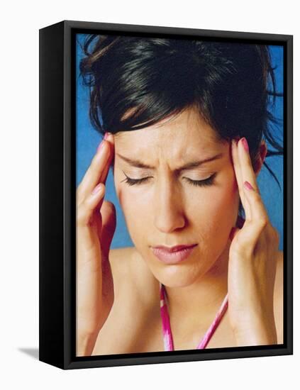 Woman Holding Her Head In Pain-Hannah Gal-Framed Premier Image Canvas