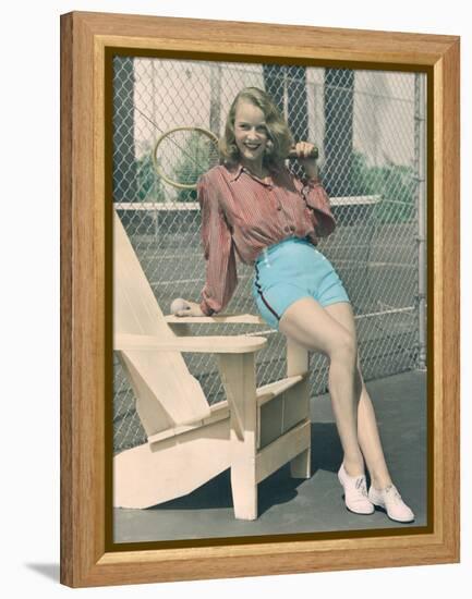 Woman Holding Tennis Racket-null-Framed Stretched Canvas