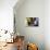 Woman Holds A Freshly Brewed Cup Of Tea In Her Home-Hannah Dewey-Photographic Print displayed on a wall