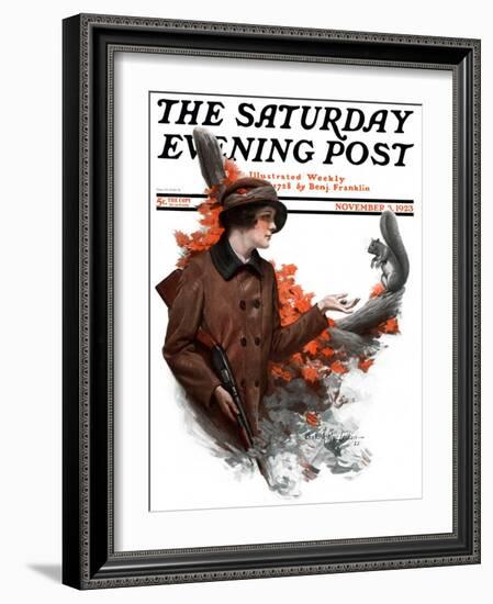 "Woman Hunter Feeding Squirrel," Saturday Evening Post Cover, November 3, 1923-Charles A. MacLellan-Framed Giclee Print