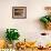 Woman in Bakery, Trogir, Croatia-Russell Young-Framed Photographic Print displayed on a wall