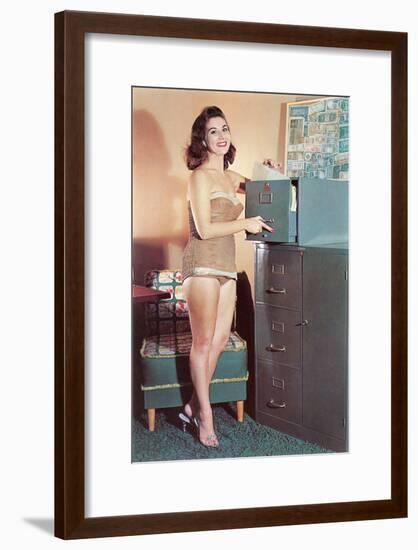 Woman in Bathing Suit with File Cabinet, Retro-null-Framed Art Print