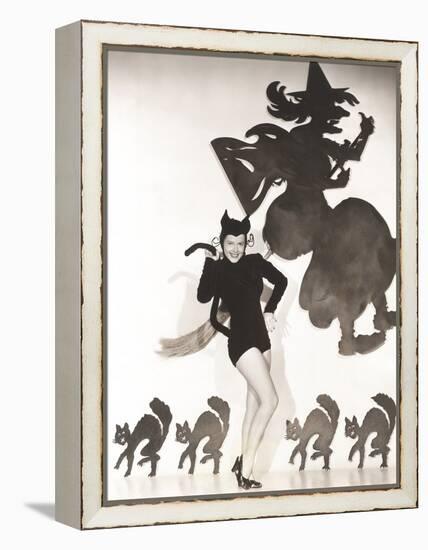 Woman in Cat Costume Posing Against Halloween Themed Wall-null-Framed Stretched Canvas