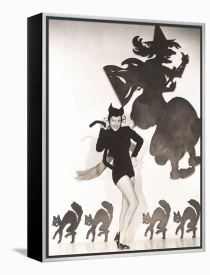 Woman in Cat Costume Posing Against Halloween Themed Wall-null-Framed Stretched Canvas