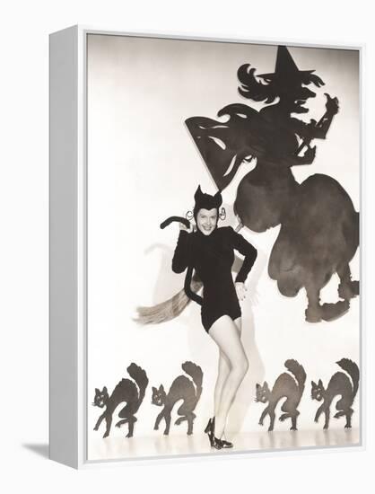 Woman in Cat Costume Posing Against Halloween Themed Wall-null-Framed Stretched Canvas