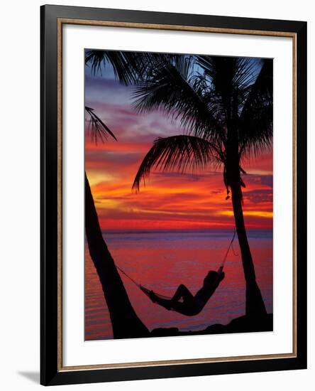 Woman in Hammock, and Palm Trees at Sunset, Coral Coast, Viti Levu, Fiji, South Pacific-David Wall-Framed Photographic Print