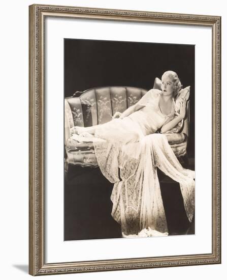Woman in Lace Gown Lounging on Sofa-null-Framed Photo
