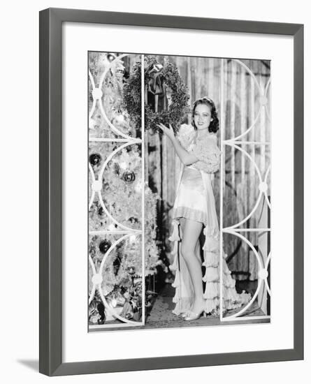 Woman in Lingerie Holding a Christmas Wreath-null-Framed Photo