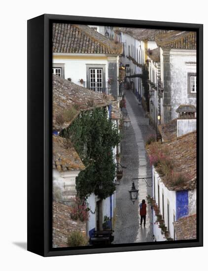 Woman in Narrow Alley with Whitewashed Houses, Obidos, Portugal-Merrill Images-Framed Premier Image Canvas