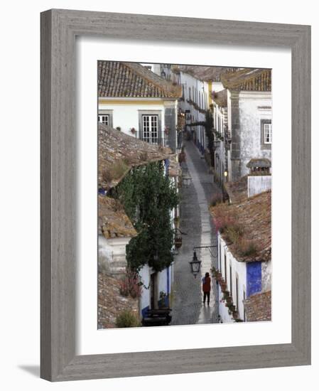 Woman in Narrow Alley with Whitewashed Houses, Obidos, Portugal-Merrill Images-Framed Photographic Print