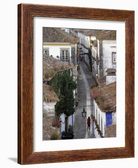 Woman in Narrow Alley with Whitewashed Houses, Obidos, Portugal-Merrill Images-Framed Photographic Print