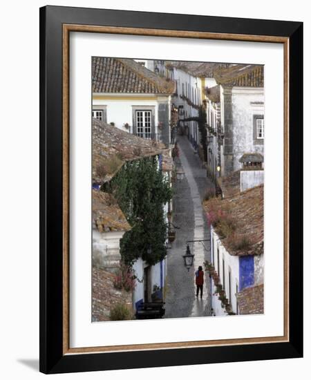 Woman in Narrow Alley with Whitewashed Houses, Obidos, Portugal-Merrill Images-Framed Photographic Print