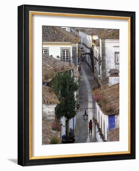 Woman in Narrow Alley with Whitewashed Houses, Obidos, Portugal-Merrill Images-Framed Photographic Print