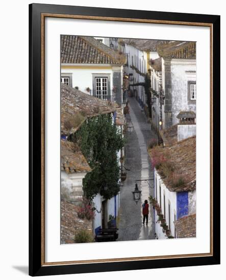 Woman in Narrow Alley with Whitewashed Houses, Obidos, Portugal-Merrill Images-Framed Photographic Print