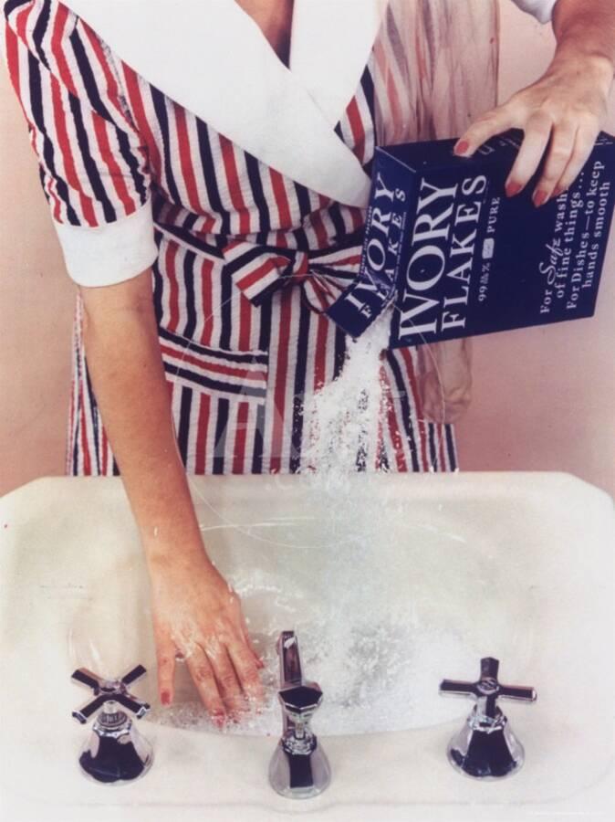 Woman In Red White And Blue Robe Pouring Ivory Soap Flakes Into Woman In Red White And Blue Robe Pouring Ivory Soap Flakes Into Bathroom Sink Photographic Print By Gjon Mili Art
