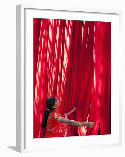 Woman in Sari Checking the Quality of Freshly Dyed Fabric Hanging to Dry, Sari Garment Factory, Raj-Gavin Hellier-Framed Photographic Print