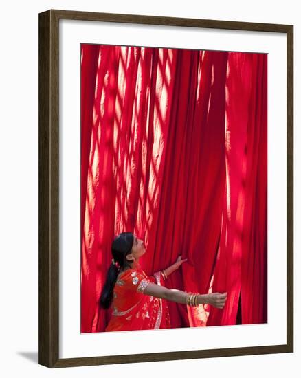 Woman in Sari Checking the Quality of Freshly Dyed Fabric Hanging to Dry, Sari Garment Factory, Raj-Gavin Hellier-Framed Photographic Print