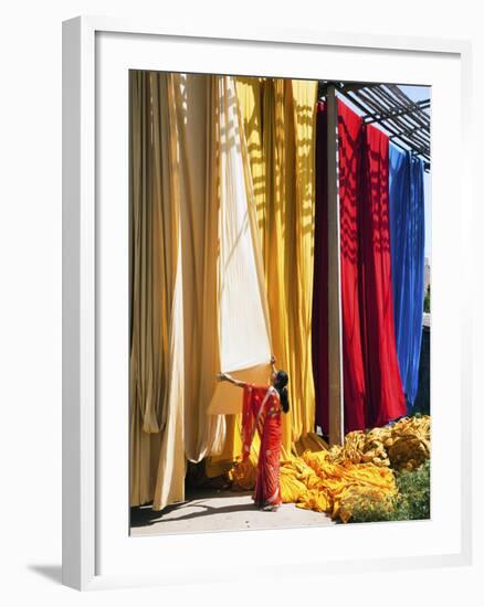 Woman in Sari Checking the Quality of Freshly Dyed Fabric Hanging to Dry, Sari Garment Factory, Raj-Gavin Hellier-Framed Photographic Print