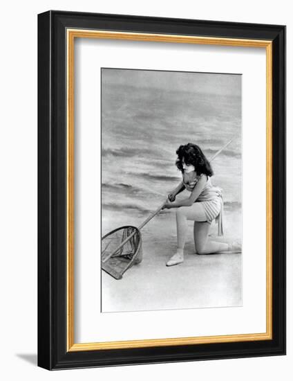 Woman in swimsuit with fishing net-French School-Framed Photographic Print