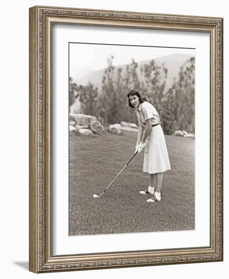 Woman in White Gloves Playing Golf-null-Framed Photo